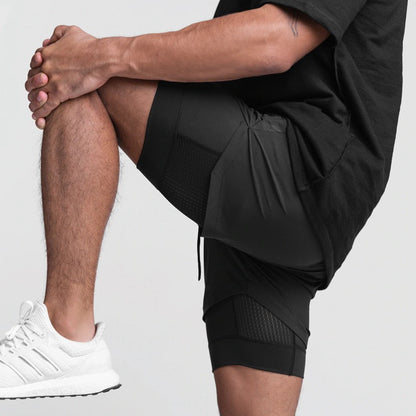 Korte sportbroek heren 2-in-1